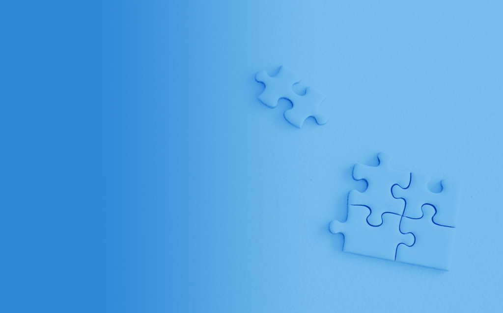 puzzle pieces on a blue background