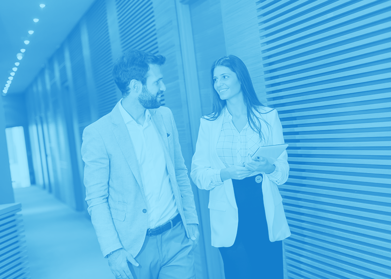 two people walking and talking